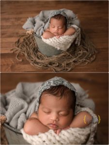 baby girl in metal bucket on wood studio floor