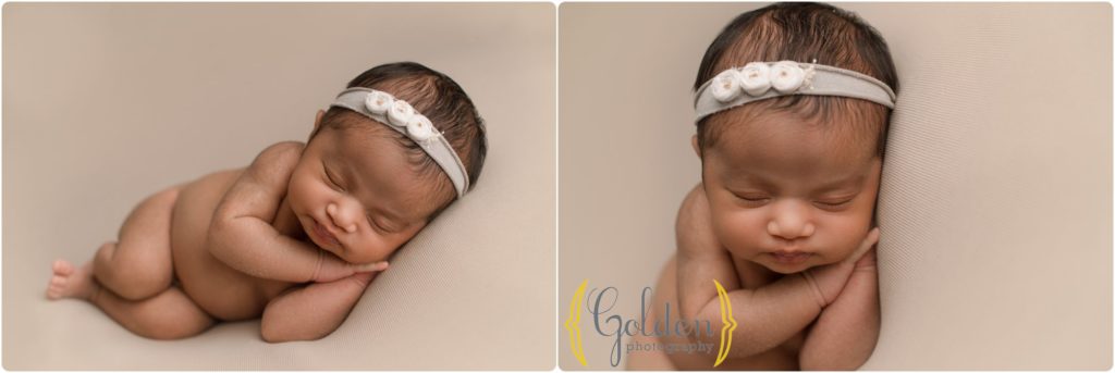 baby girl laying on side on blanket