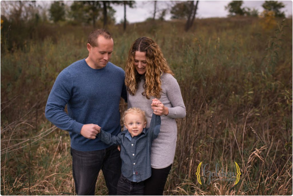 family of three in the grass near Libertyville IL