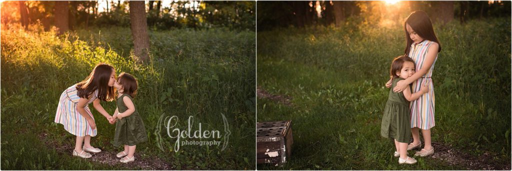sisters hugging in a forest at sunset near Libertyville IL
