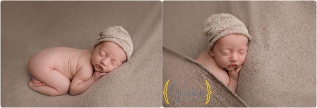 baby boy wearing hat in Chicago newborn studio