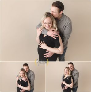 pregnant couple posed in Lake County IL photo studio