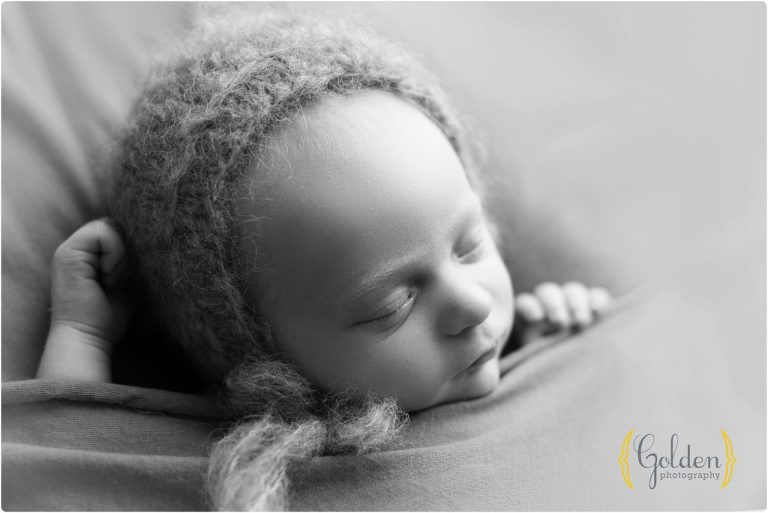 black and white of baby sleeping in Lake Zurich IL photo studio