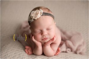 newborn baby girl posed in lake county IL photo studio
