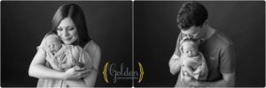 black and white photo parents holding baby in photography studio near Vernon Hills IL