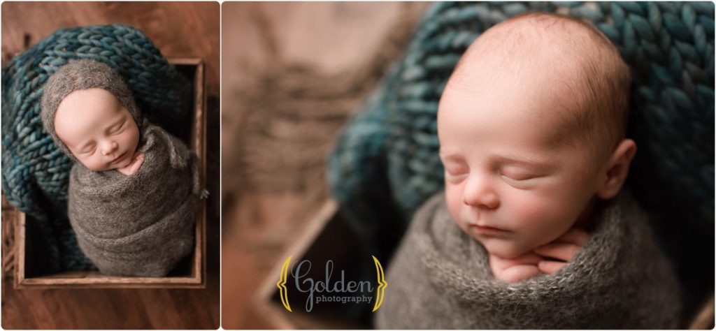 baby sleeping in crate with Chicago newborn photographer