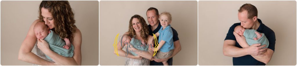 family posed with newborn baby boy in Lake County IL photography studio