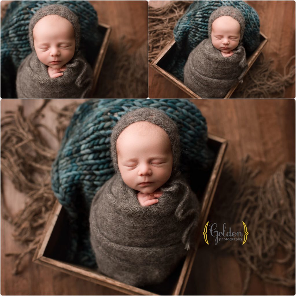 baby boy sleeping in crate in Chicago area newborn studio