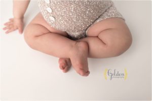 chubby baby legs in photography studio near Chicago IL