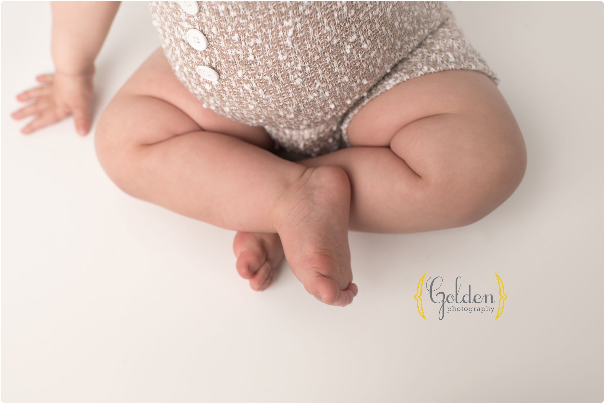 chubby baby legs in photography studio near Chicago IL