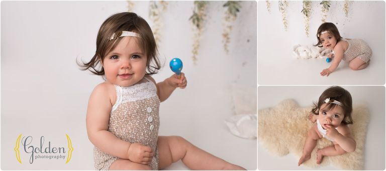 baby girl in photography studio for 1 year photos