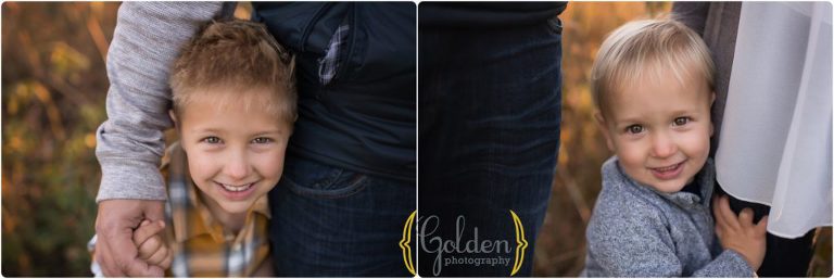 two boys hug parents for outdoor family photos near Buffalo Grove IL