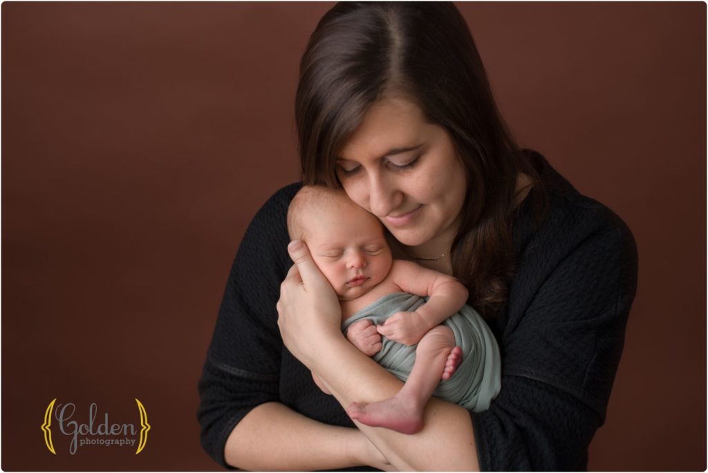 mom old baby boy in photography studio near Chicago IL