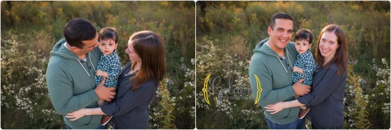 parents holding 1 year old during family photos in Barrington IL