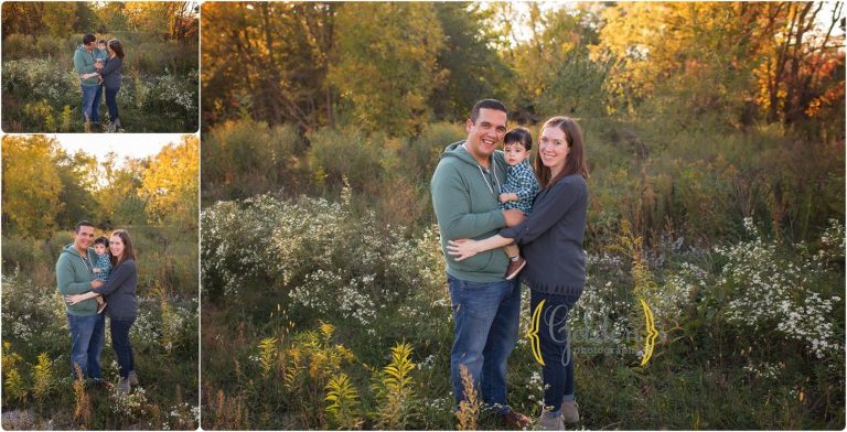 parents standing with 1 year old son in a field near Barrington IL for family phtotos