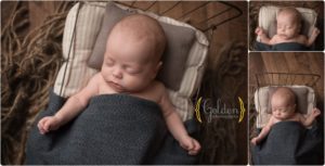 baby sleeping in tiny bed prop in Chicago IL newborn photo studio