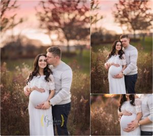 pregnant couple posing for outdoor maternity photos in park near Chicago IL