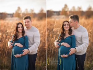 young couple holding pregnant belly for maternity photos in Glenview IL park