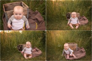 little boy sitting outdoors by a create with family photographer in lake County IL park