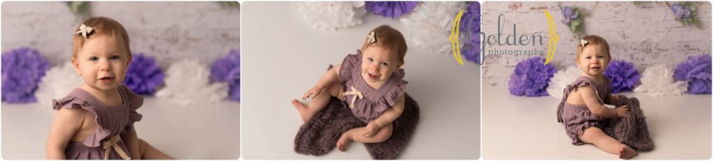 baby girl smiling for 1 year old photo session