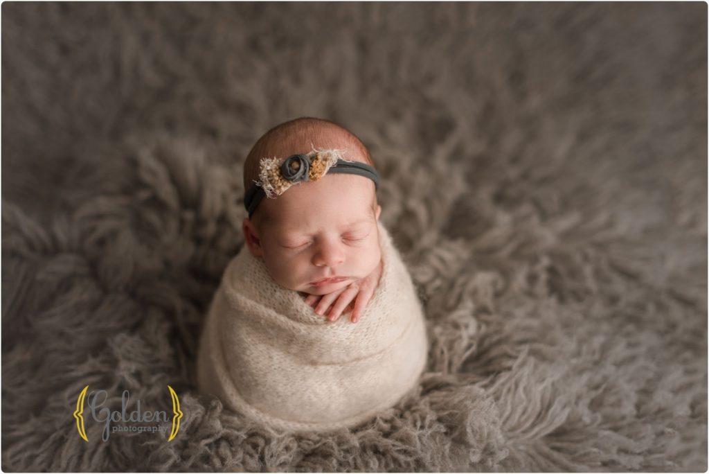 posed sleeping newborn in Chicago studio