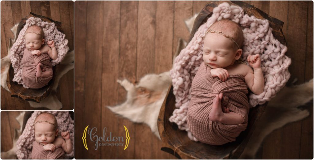 baby girl swaddled in Chicago photo studio