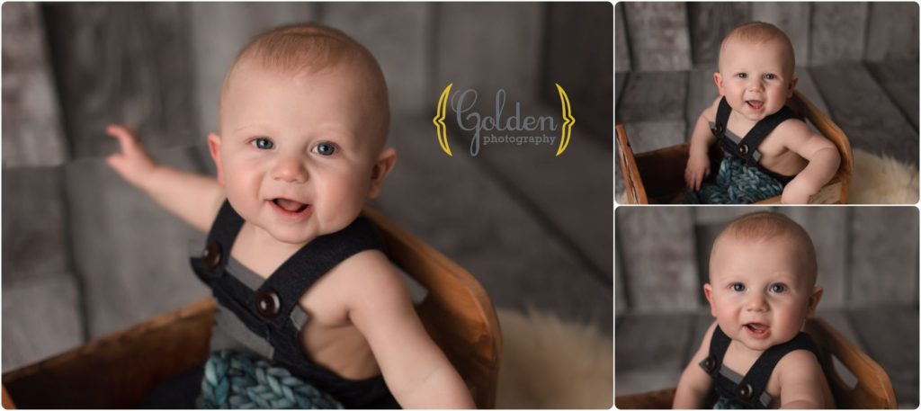 baby boy sitting in prop for photos in Lake County studio