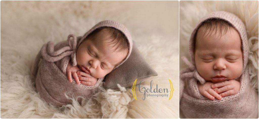 newborn swaddled in photography studio