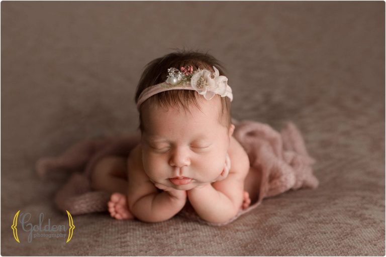 composite of newborn in photo studio