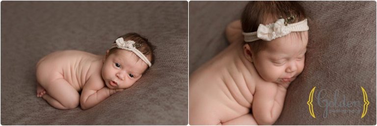 baby girl wearing headband in photo studio