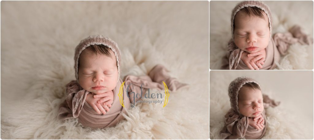 baby girl wrapped in mauve