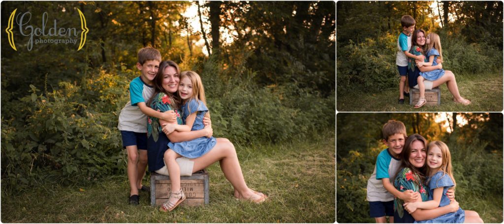 mom poses outdoor with young children in Barrington IL