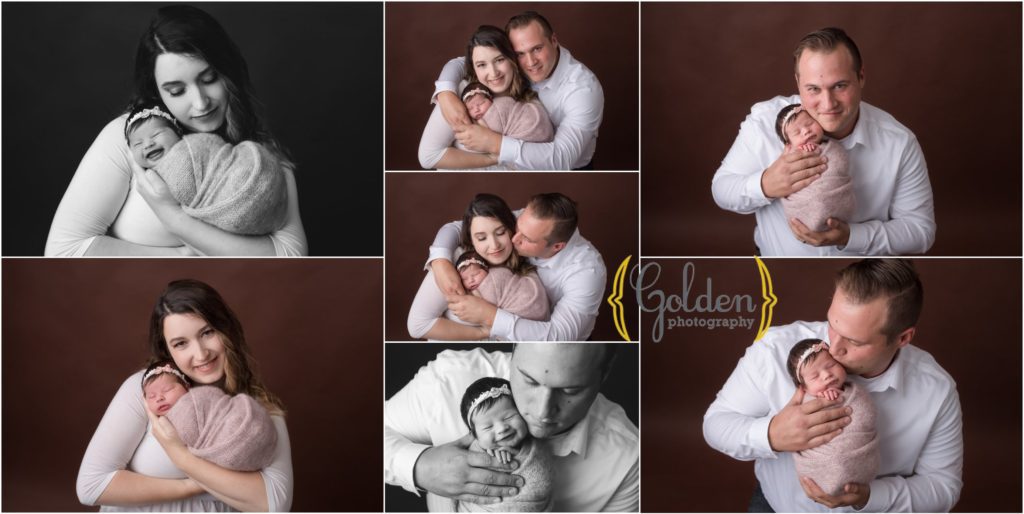 parents holding newborn baby in Lake Zurich photo studio