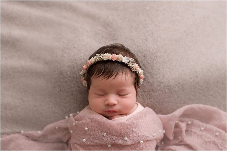 baby girl with flower crown for newborn photos in Lake Zurich IL