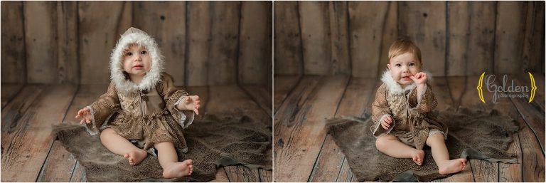 baby girl wearing hooded outfit in Lake Zurich IL photo studio
