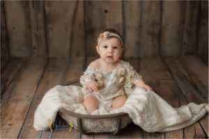 baby girl sitting in Lake Zurich photo studio