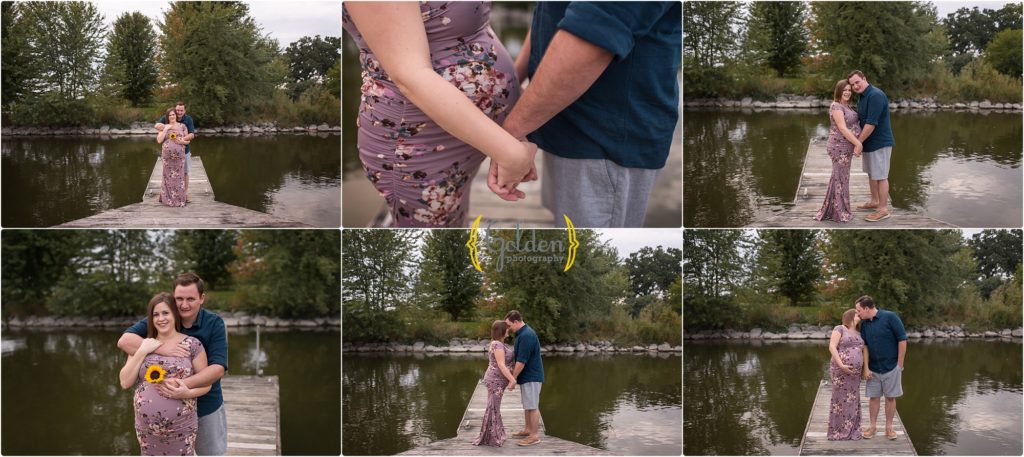man and pregnant wife standing on dock at marina for maternity photos in Barrington Illinois