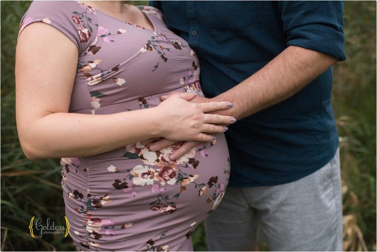 hand on pregnant moms belly during maternity photo session in Barrington Illinois