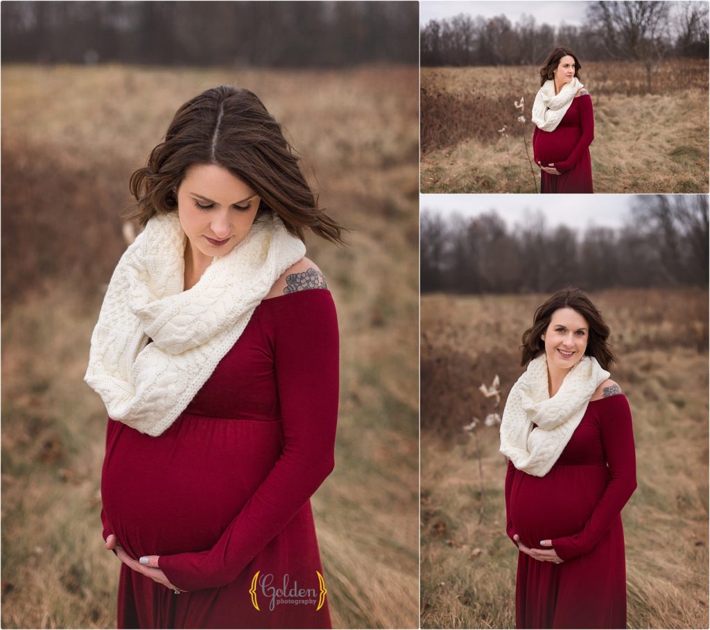 pregnant mom poses in field outside Chicago IL in a red dress