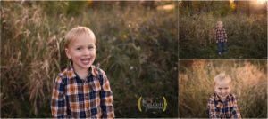 boy posing for family photos in a field near Palatine IL