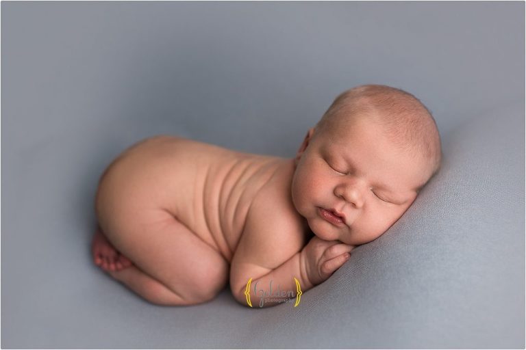 sleeping baby boy with rolls in Lake Zurich IL photo studio