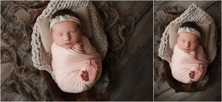 newborn baby swaddled in pink laying down for newborn photos near Crystal Lake IL