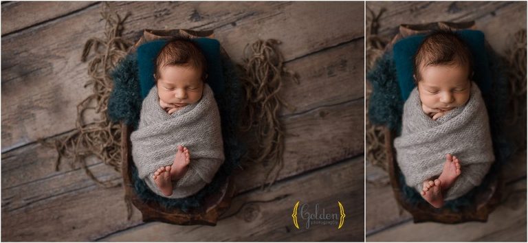 baby boy swaddled in grey for newborn photo session