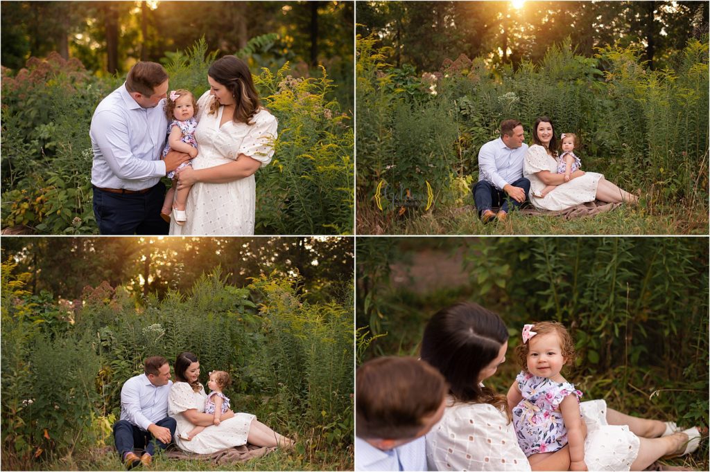 family of three holding daughter for outdoor family photos Chicago
