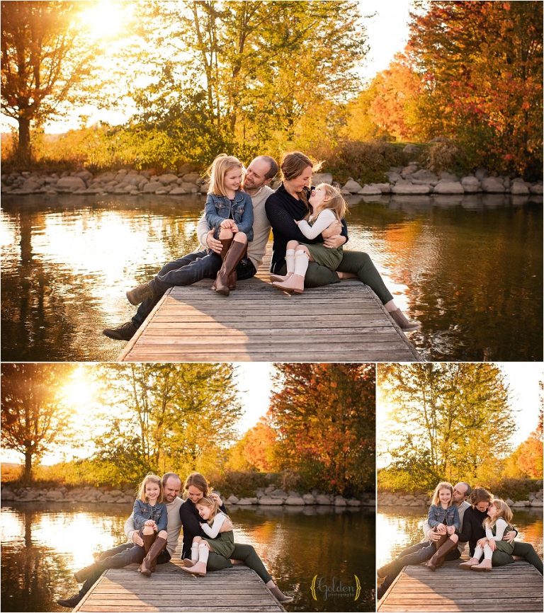 parents snuggling chiuldren on a Lake Barrington dock for family photos