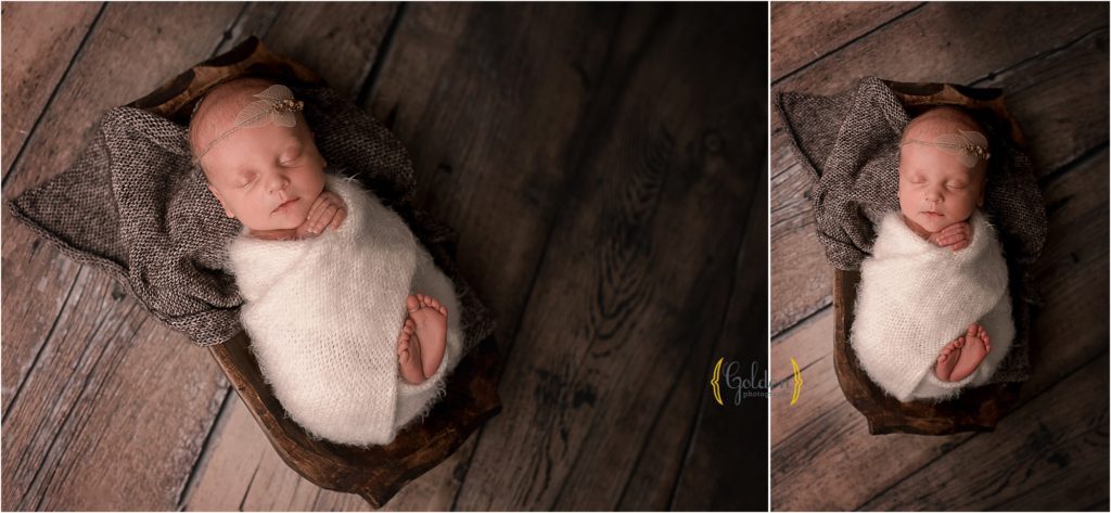 baby girl in wooden bowl for newborn photography session in Illinois