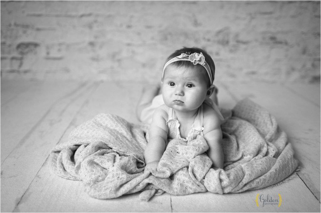 black and white of baby on tummy in Hawthorn Woods studio