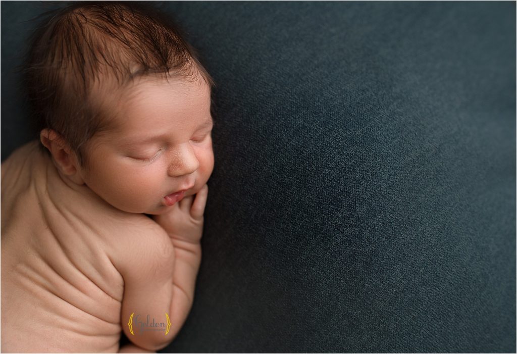 above view of sleeping newborn baby for newborn photographer near Lake Bluff IL