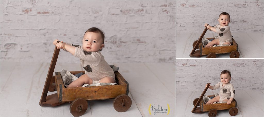 child sits in crate in Grayslake IL photo studio