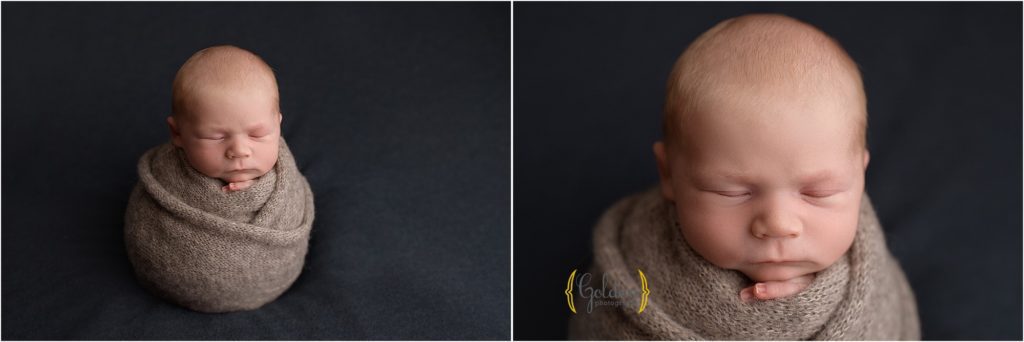 swaddled baby boy asleep on blue fabric for newborn portraits in Palatine IL